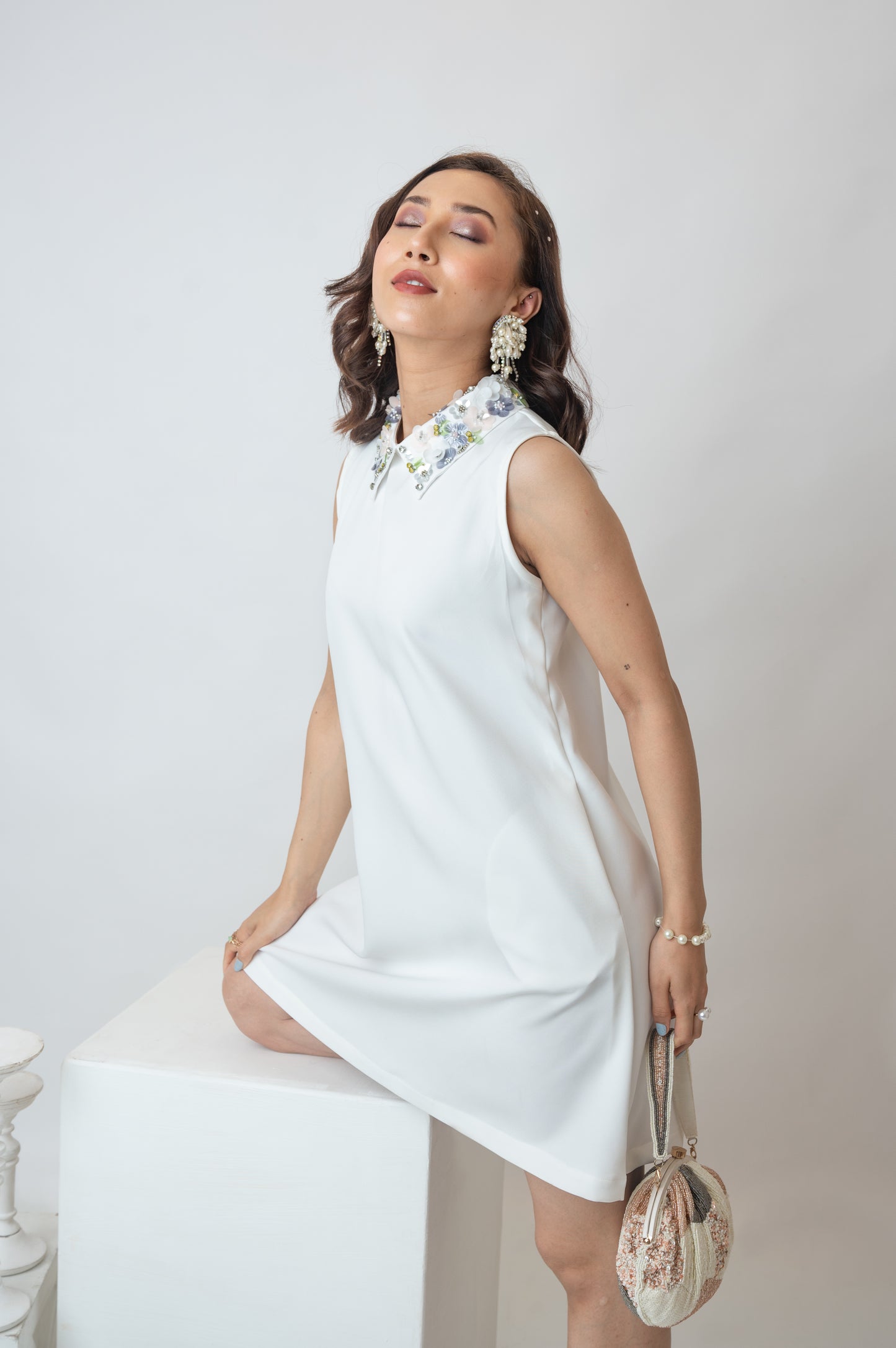 Sleeveless White Dress With Embellished Collar